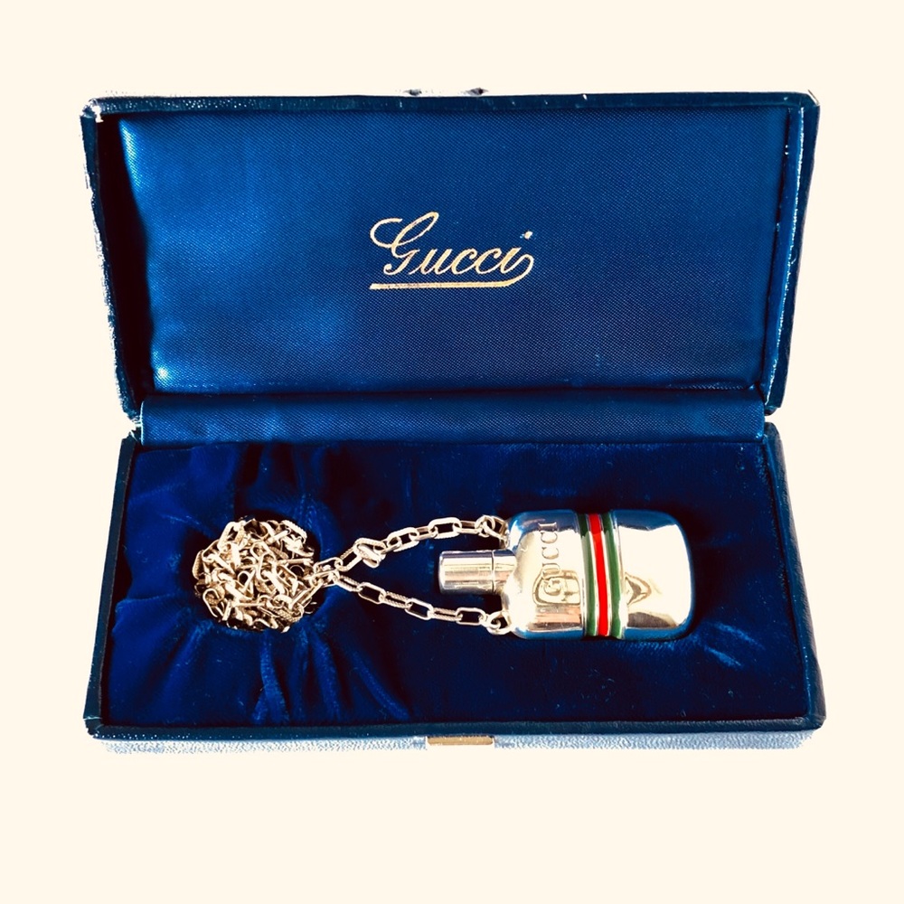Authentic Gucci perfume holder pendant.